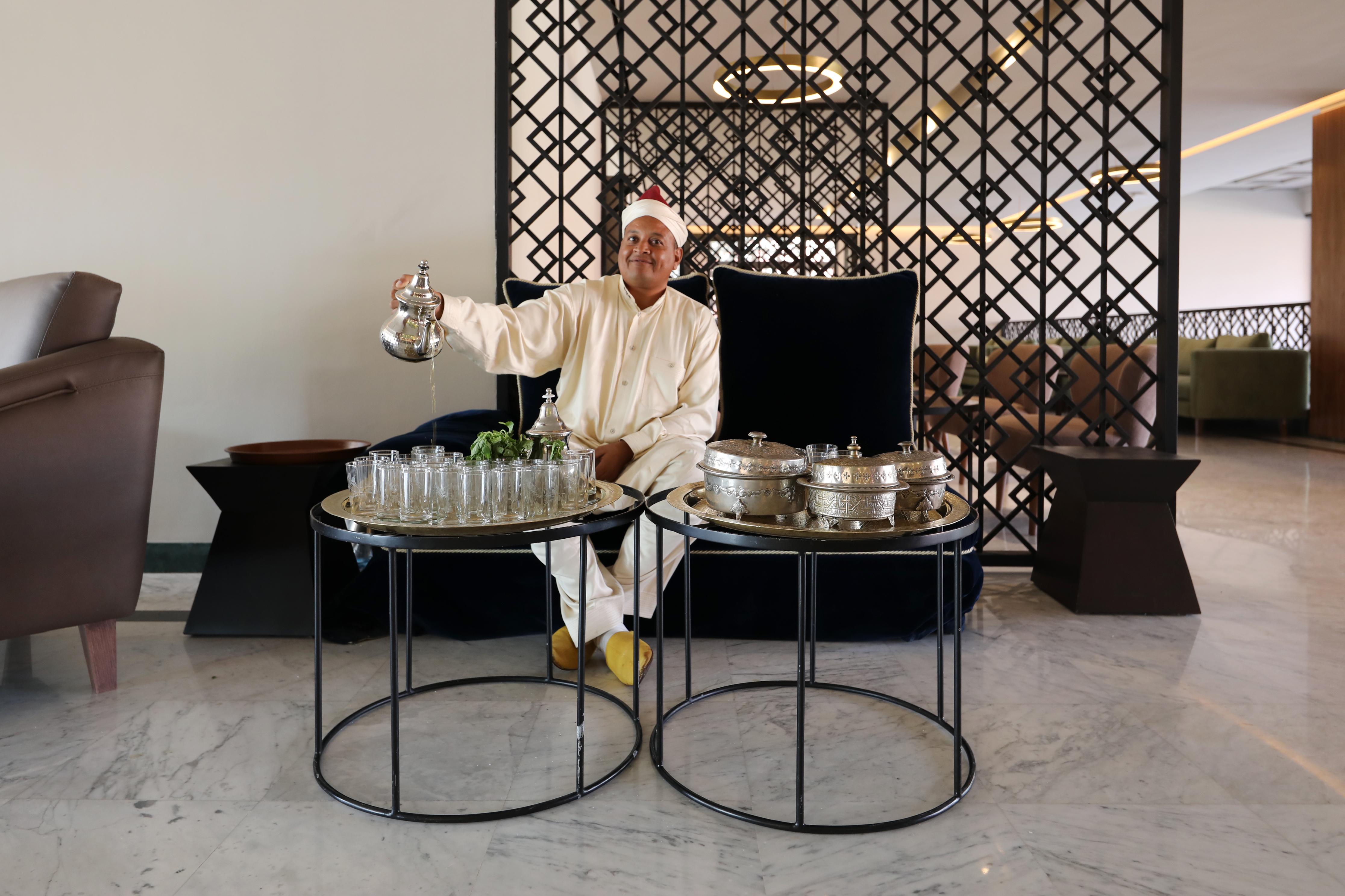 Kenzi Farah Hotel Marrakesh Exterior photo A Moroccan tea ceremony