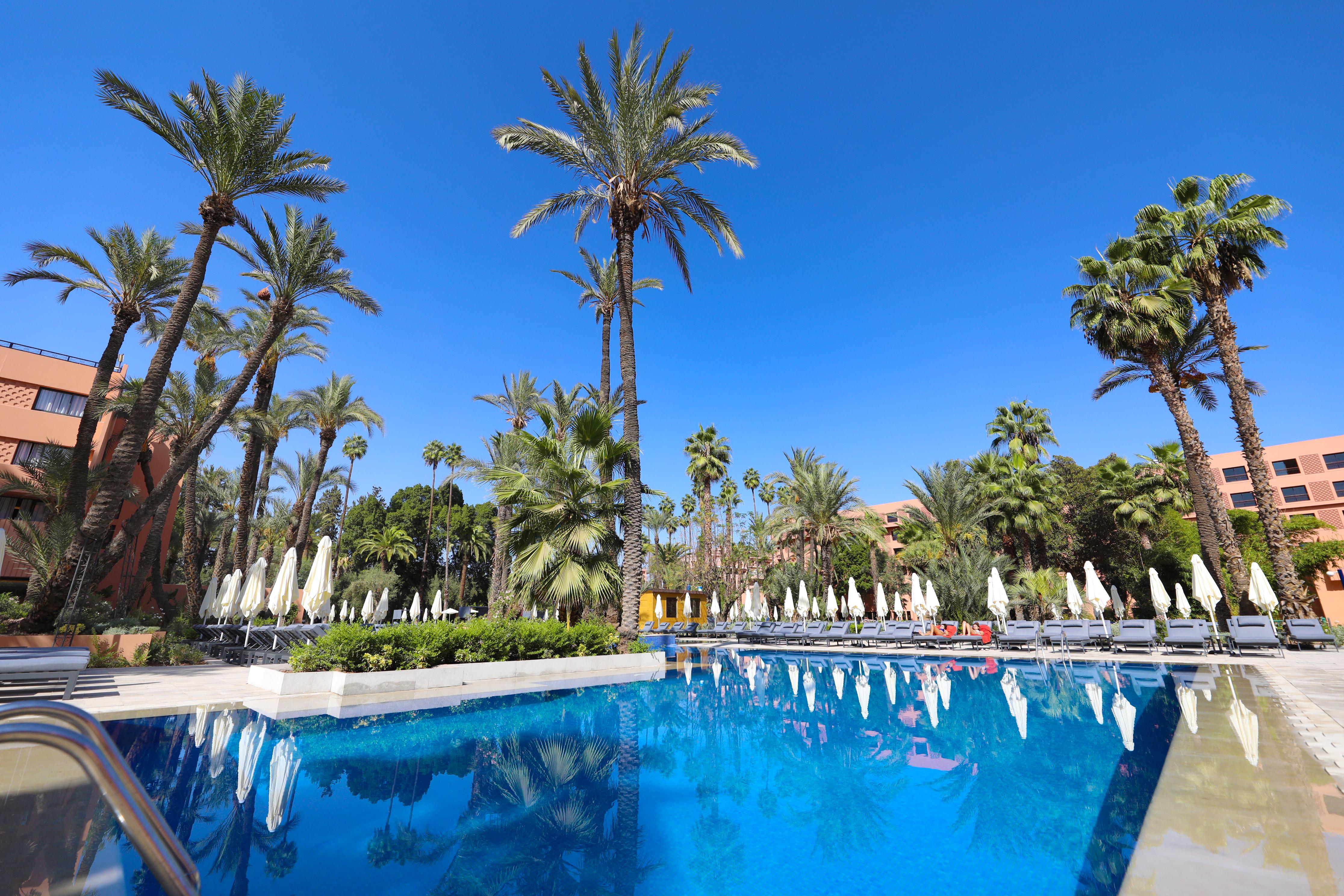 Kenzi Farah Hotel Marrakesh Exterior photo A swimming pool in a hotel in Morocco